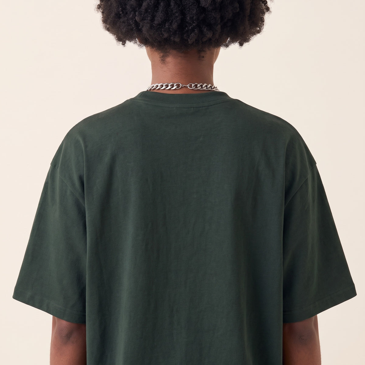 Base Blackness Tee Green — upper back detail, clean plain back and drop-shoulder seams, oversized heavyweight cotton streetwear tee by We Are Blackness