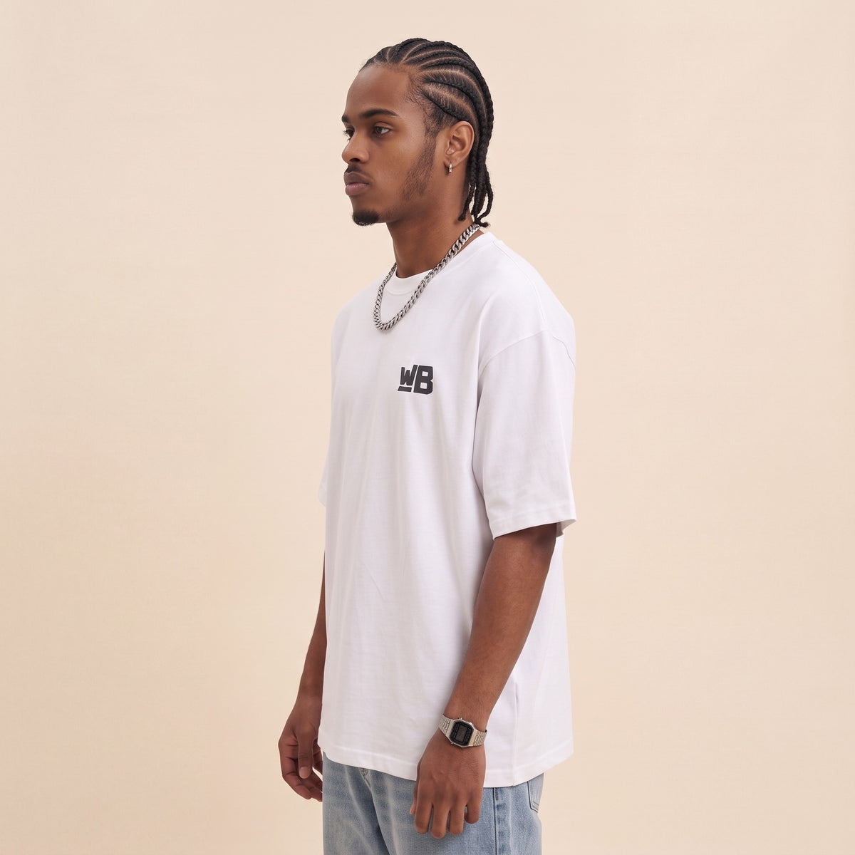 Blackness Emancipation Tee White — side view of the drop-shoulder sleeve and boxy oversized fit, oversized heavyweight cotton streetwear tee by We Are Blackness