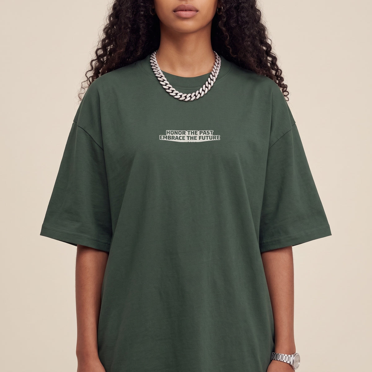 Blackness Honor & Embrace Tee Cactus Green — close-up of the Honor the Past, Embrace the Future chest print and ribbed collar, oversized heavyweight cotton streetwear tee by We Are Blackness